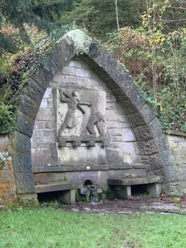 FEB6EB1F-61E6-47CD-AFF9-239DA0F75E45 The Siegfried Fountain in Odenheim: the place where Hagen von Tronje killed Siegfried von Xanten, hero of the Nibelungen saga