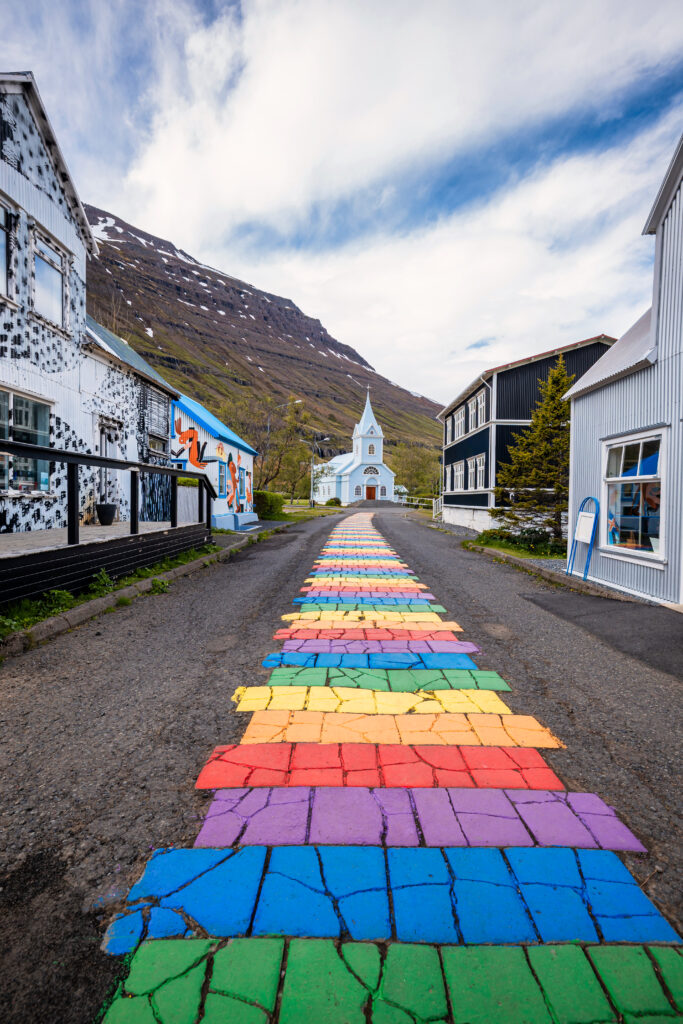 famous-rainbow-road-seydisfjordur-with-icelandic-buildings-around-show-artwork-painted-walls-seydisfjordur-town-iceland-1-683x1024 Seyðisfjörður: A Gateway to Icelandic Myth and Mystique